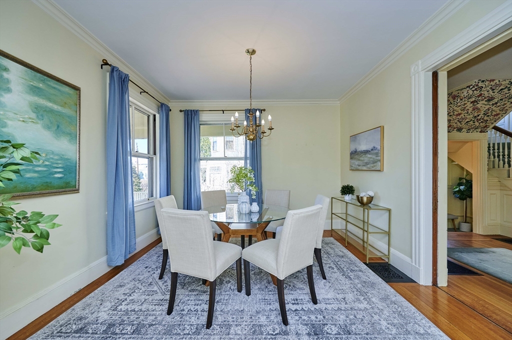 32 Lenox Street Newton, MA 02465 - Photo 6 of 36 a dining room with furniture window and wooden floor