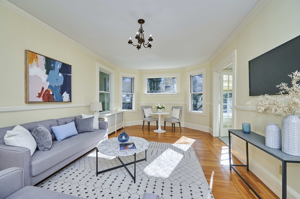 32 Lenox Street Newton, MA 02465 - Photo 9 of 36 a living room with furniture and wooden floor