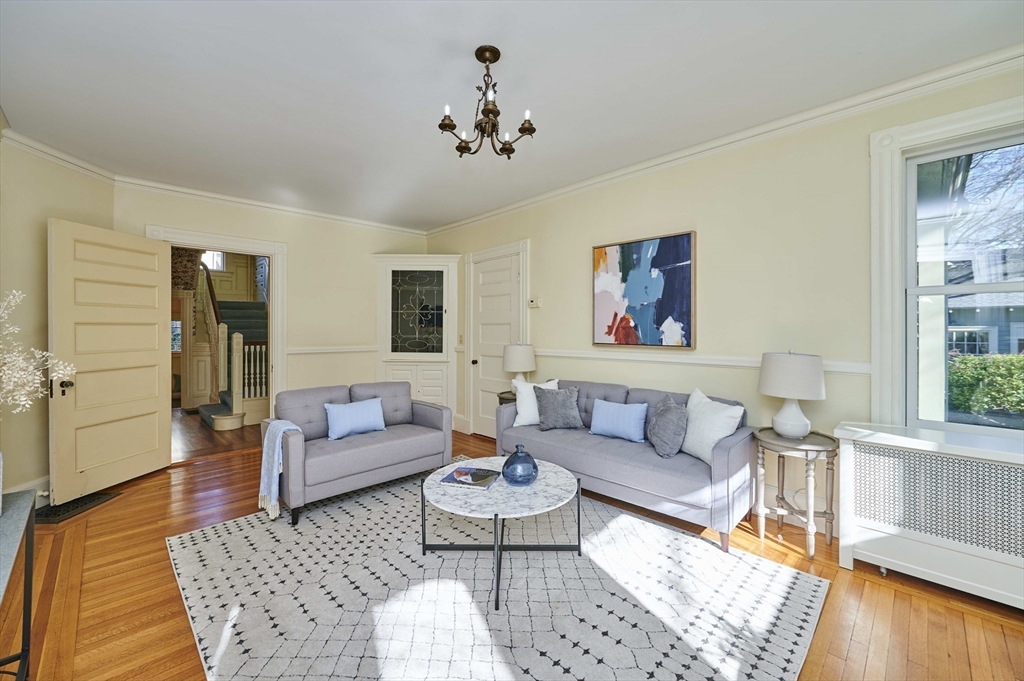 32 Lenox Street Newton, MA 02465 - Photo 10 of 36 a living room with furniture and a rug