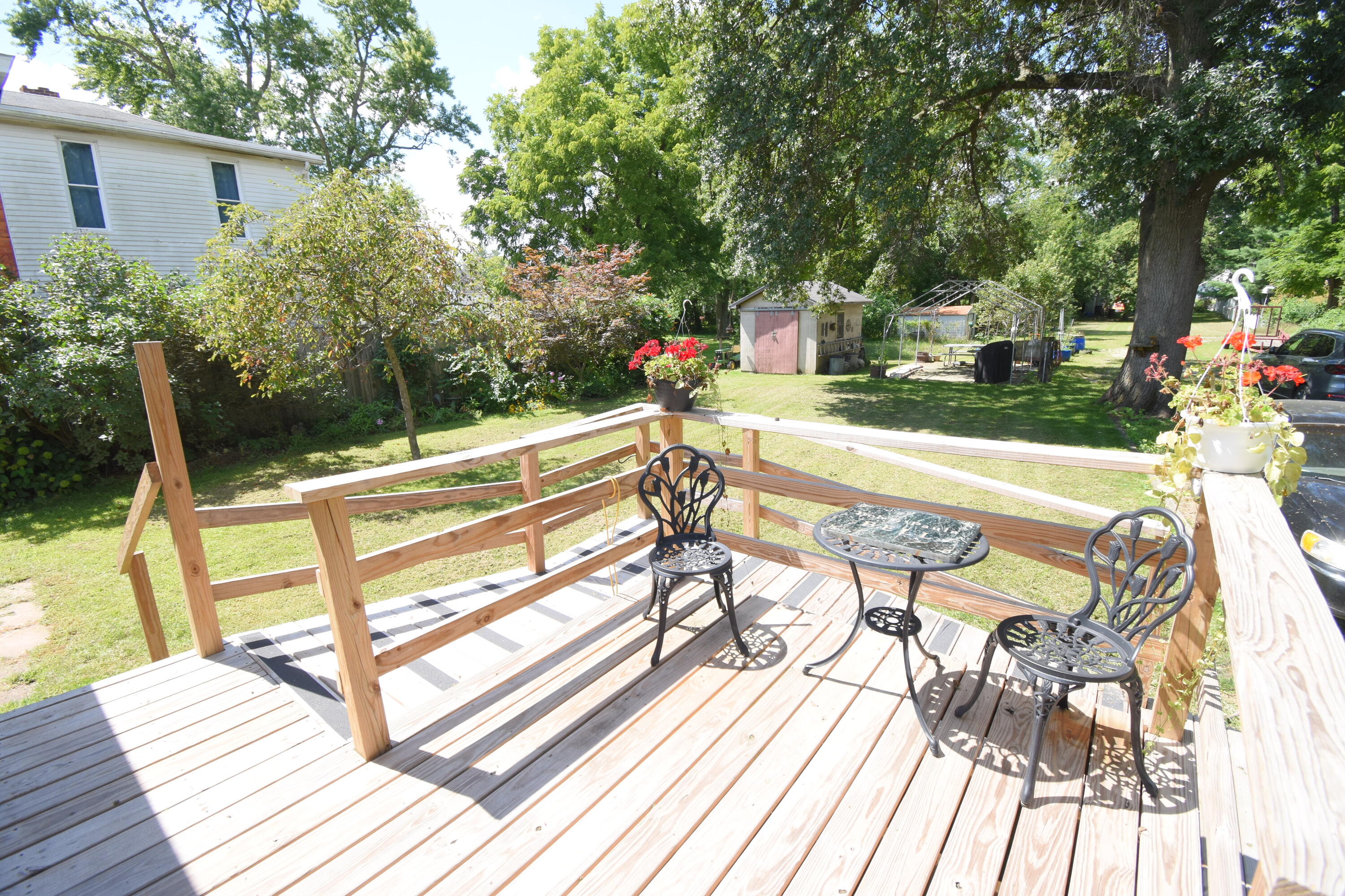 522 North Cullen Street Rensselaer, IN 47978 - Photo 40 of 43 a view of a chairs and table on the wooden deck