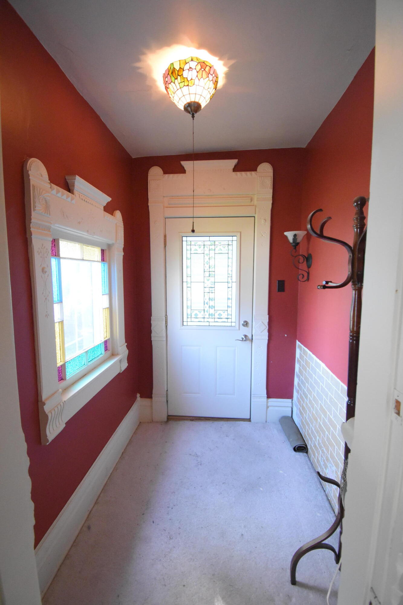522 North Cullen Street Rensselaer, IN 47978 - Photo 4 of 43 wooden floor in an empty room with a window