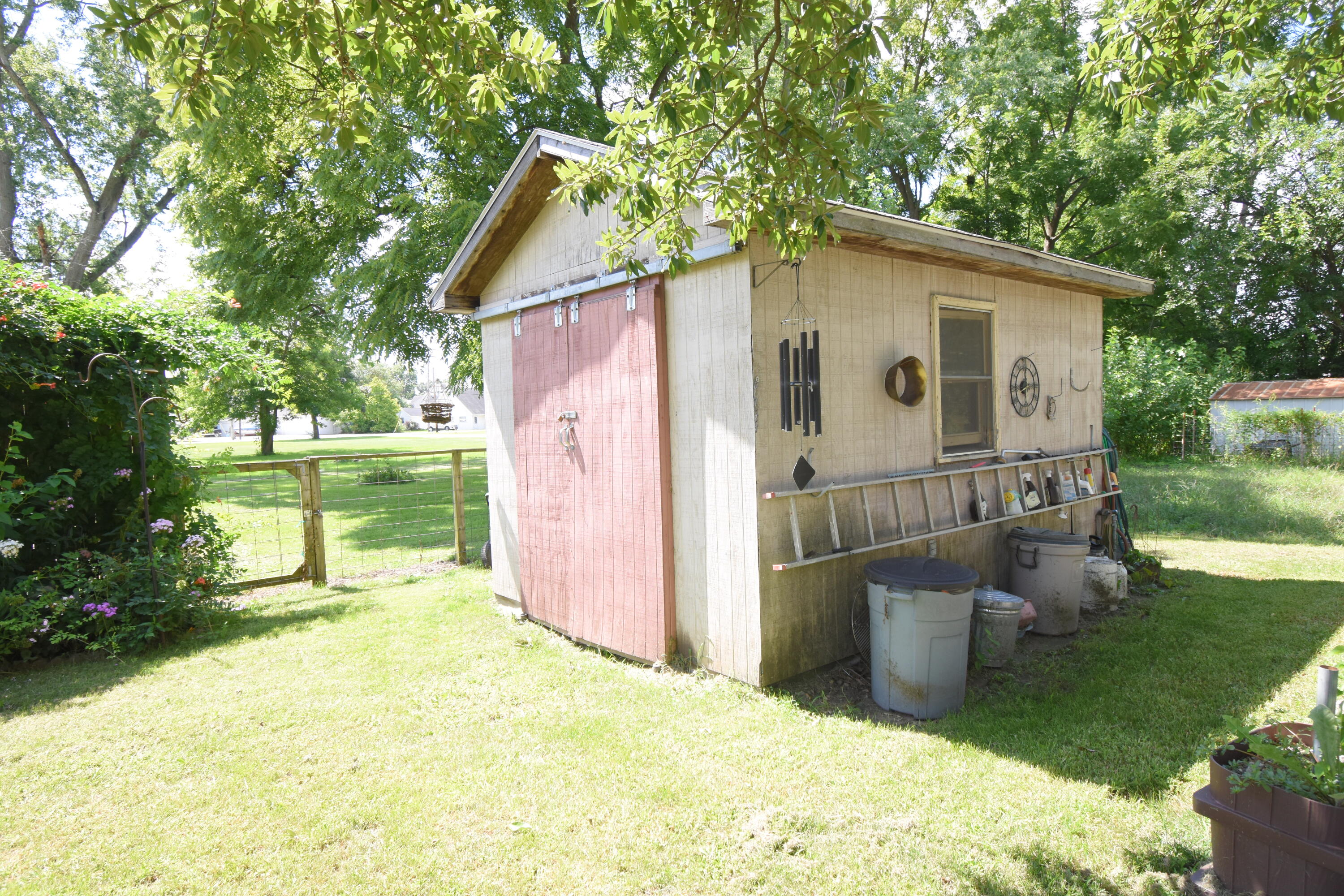 522 North Cullen Street Rensselaer, IN 47978 - Photo 42 of 43 a backyard of a house with yard and outdoor seating