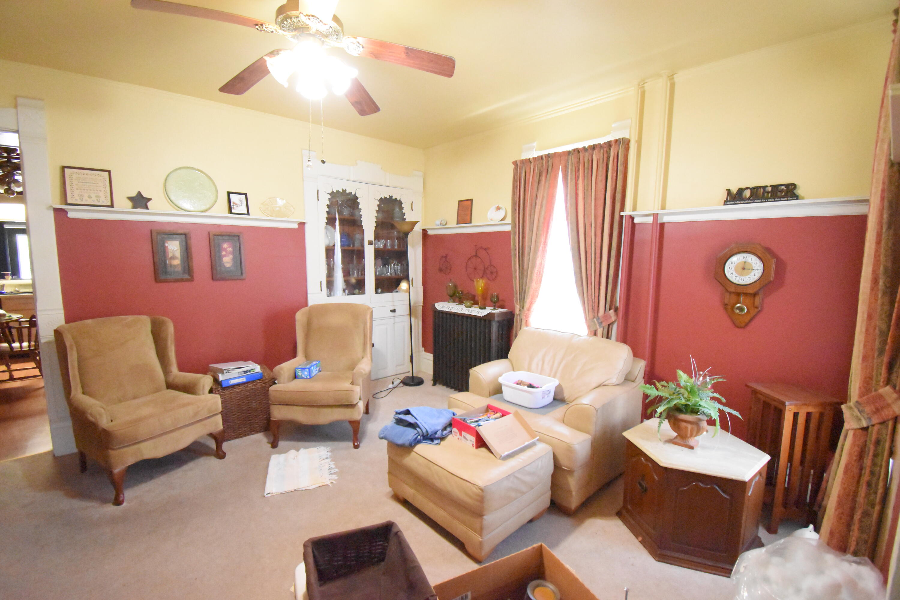 522 North Cullen Street Rensselaer, IN 47978 - Photo 6 of 43 a living room with furniture and a flat screen tv