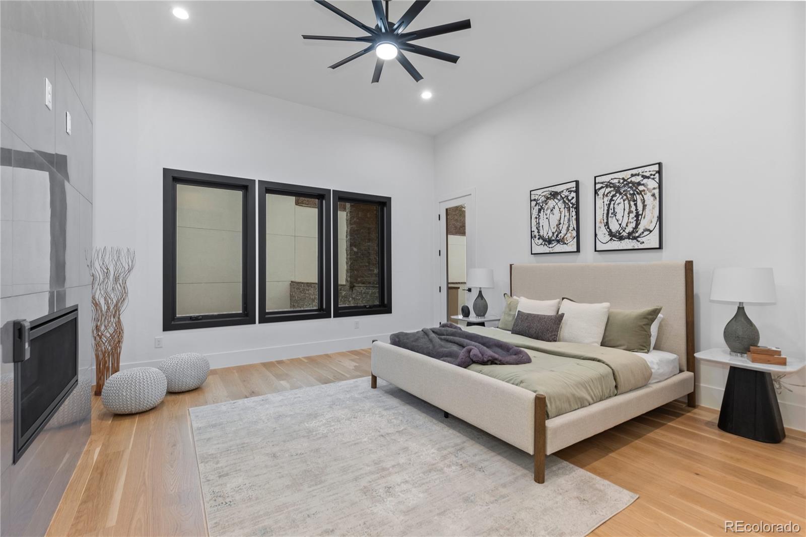 8103 Raphael Lane Littleton, CO 80125 - Photo 15 of 31 a living room with furniture and a flat screen tv