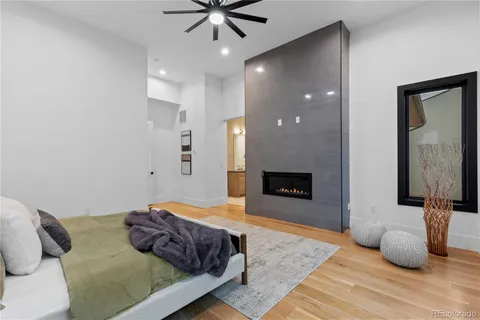 a bathroom with a tub toilet and shower