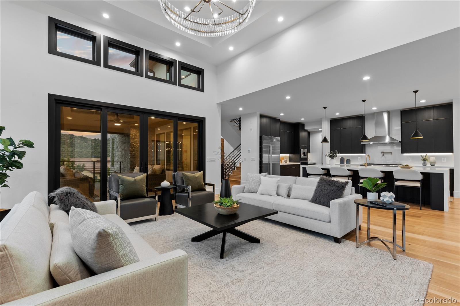8103 Raphael Lane Littleton, CO 80125 - Photo 10 of 31 a living room with furniture and a large window