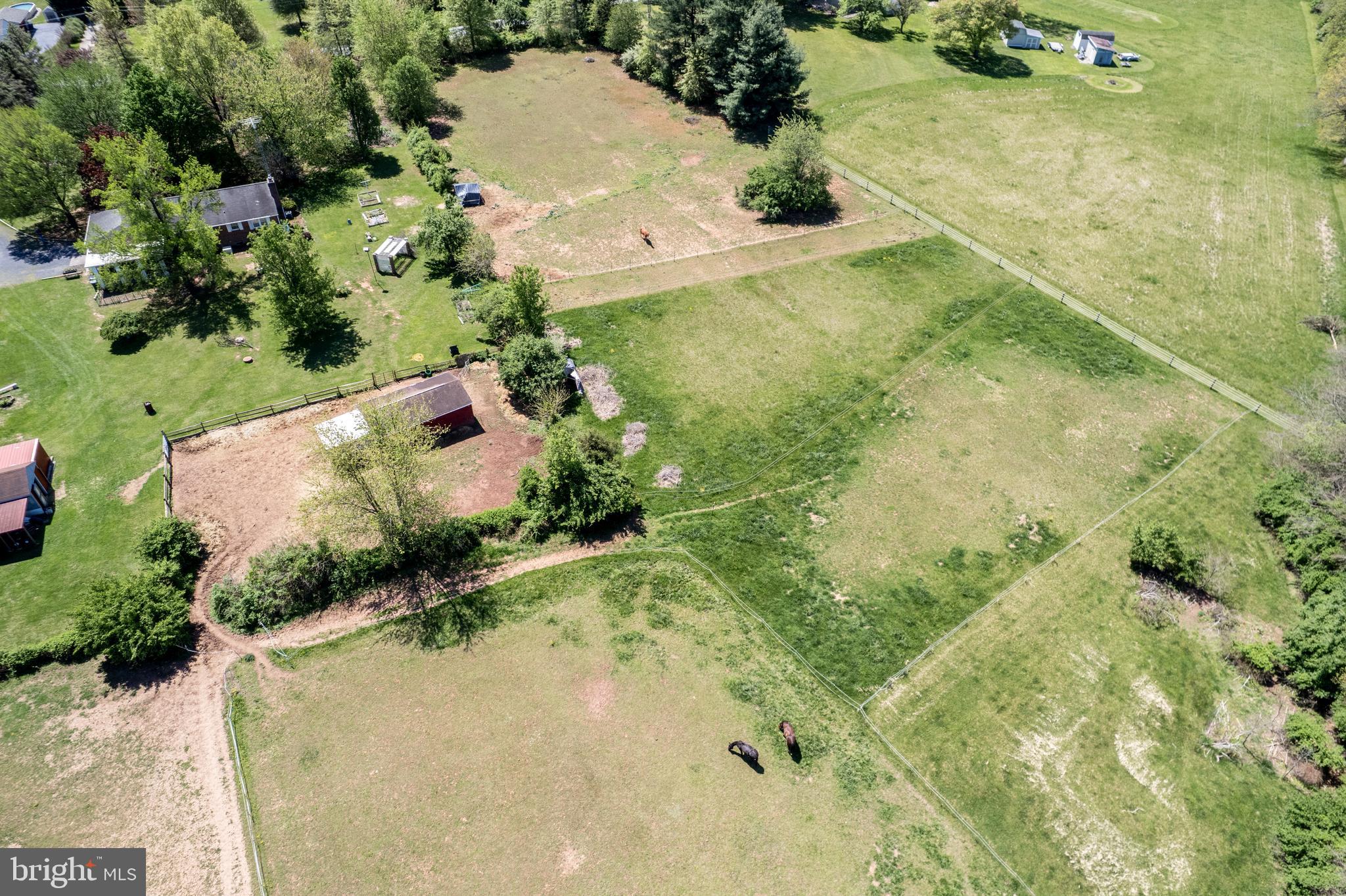 2226 Harney Road Littlestown, PA 17340 - Photo 111 of 113 an aerial view of residential house with pool and trees