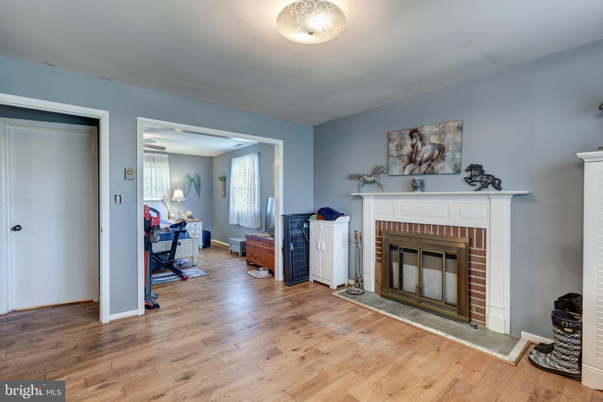 2226 Harney Road Littlestown, PA 17340 - Photo 48 of 113 a living room with furniture and a fireplace