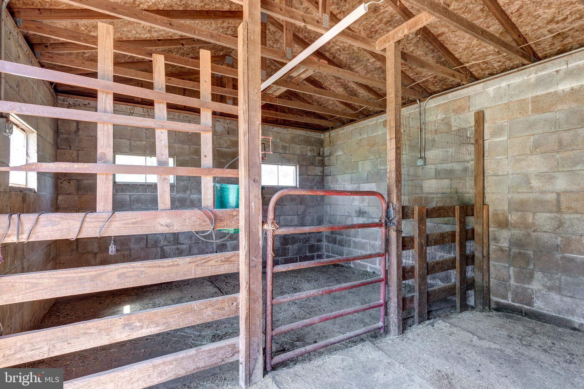 2226 Harney Road Littlestown, PA 17340 - Photo 80 of 113 a view of bedroom with a balcony and staircase