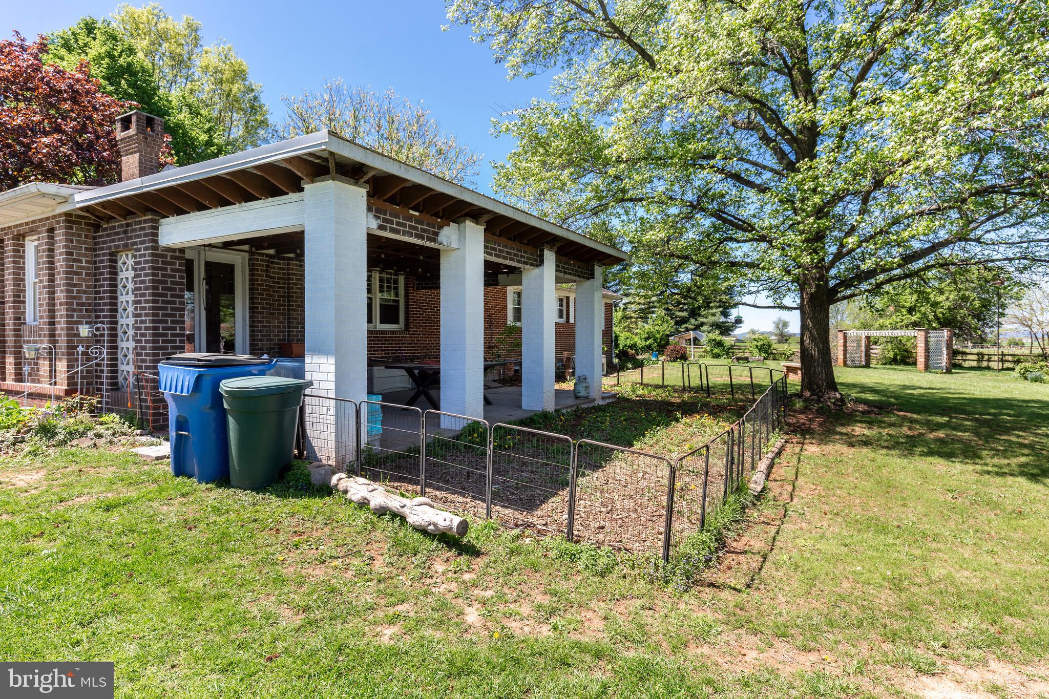 2226 Harney Road Littlestown, PA 17340 - Photo 90 of 113 a view of a house with backyard porch and sitting area