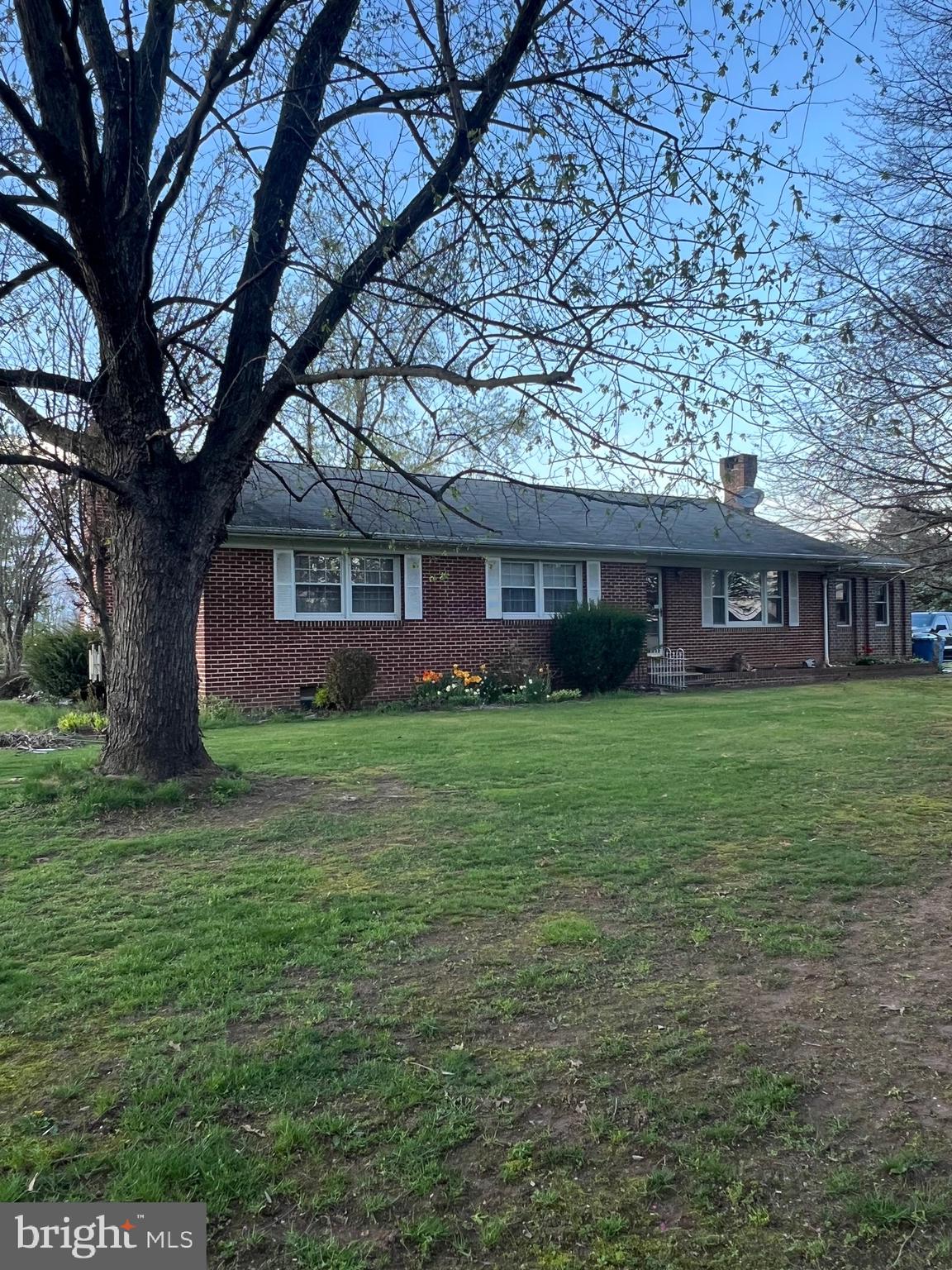 2226 Harney Road Littlestown, PA 17340 - Photo 9 of 113 a front view of a house with a garden