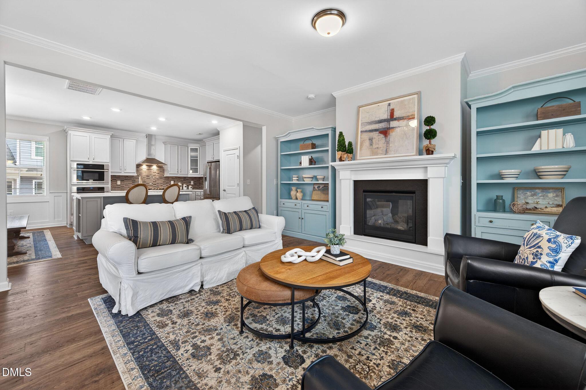 528 Spring Flower Court Cary, NC 27511 - Photo 12 of 51 Living Room open to Kitchen