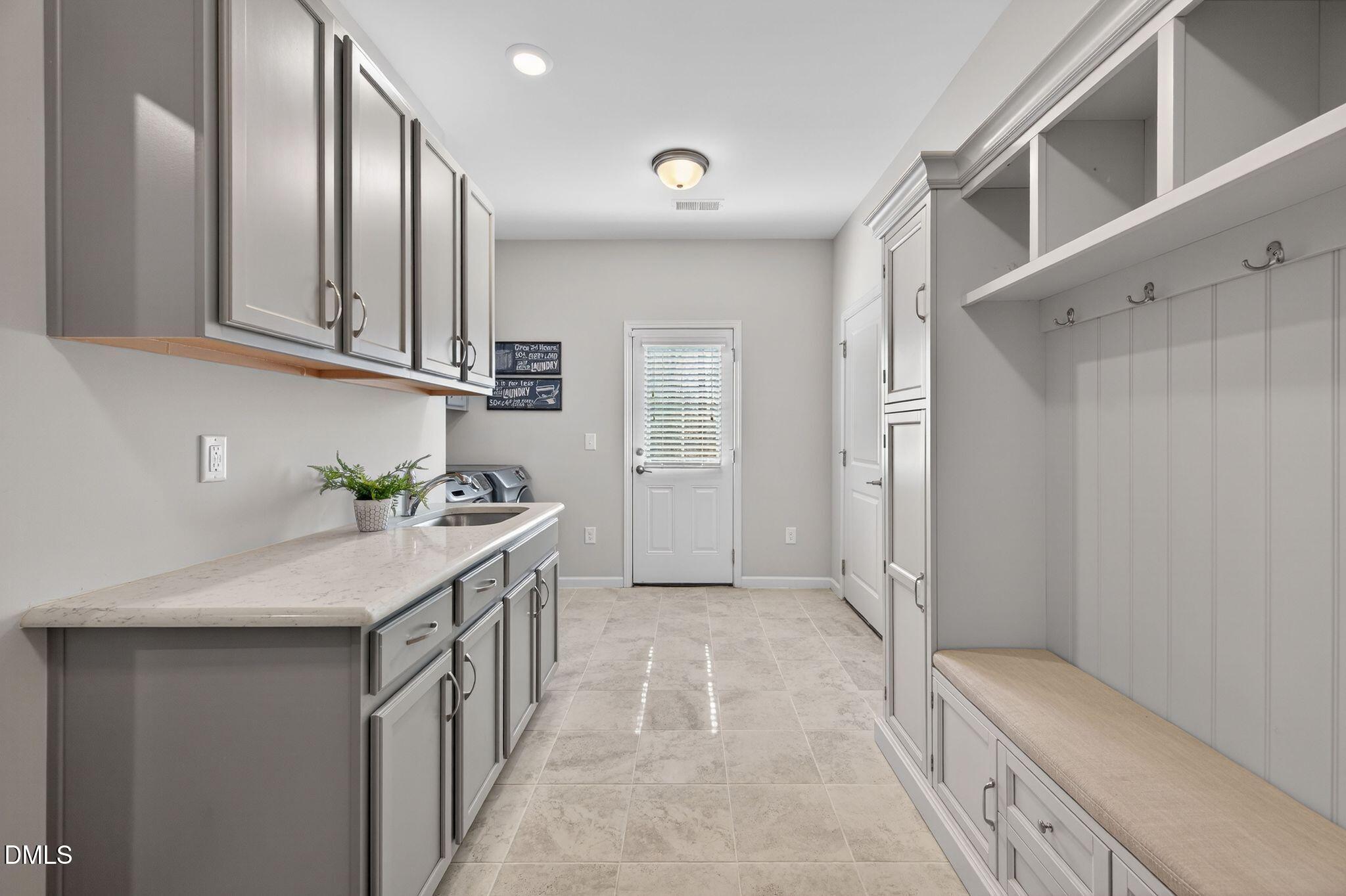528 Spring Flower Court Cary, NC 27511 - Photo 31 of 51 Laundry Room