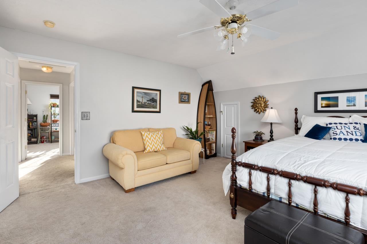 208 Kingsport Road Waynesboro, VA 22980 - Photo 25 of 38 a bedroom with furniture and a chandelier
