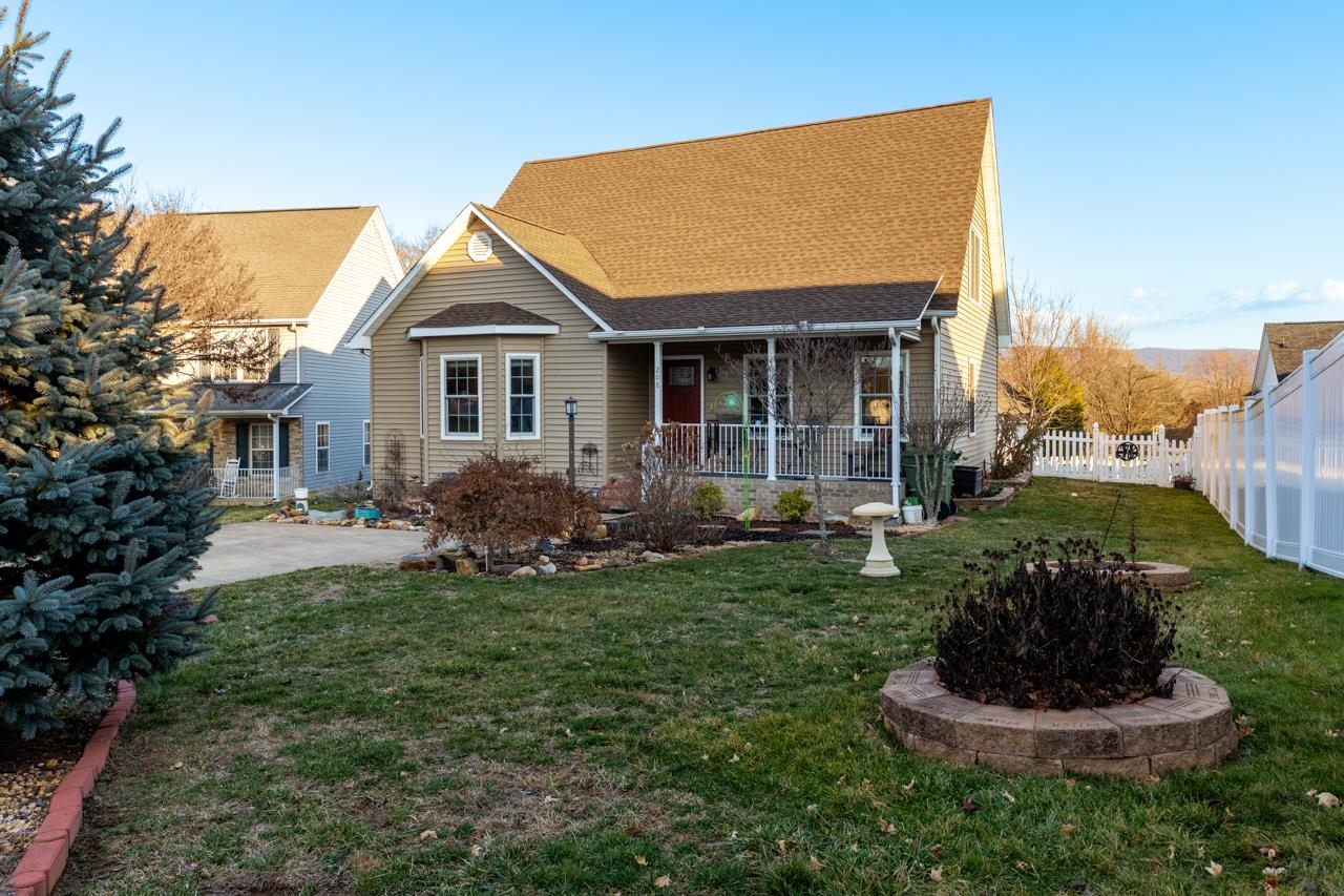 208 Kingsport Road Waynesboro, VA 22980 - Photo 3 of 38 a view of a house with a yard and potted plants