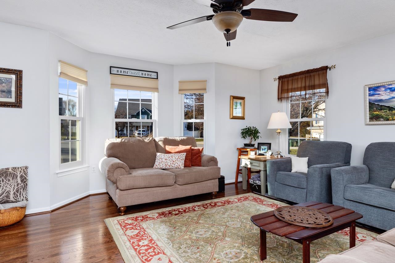 208 Kingsport Road Waynesboro, VA 22980 - Photo 7 of 38 a living room with furniture and a wooden floor