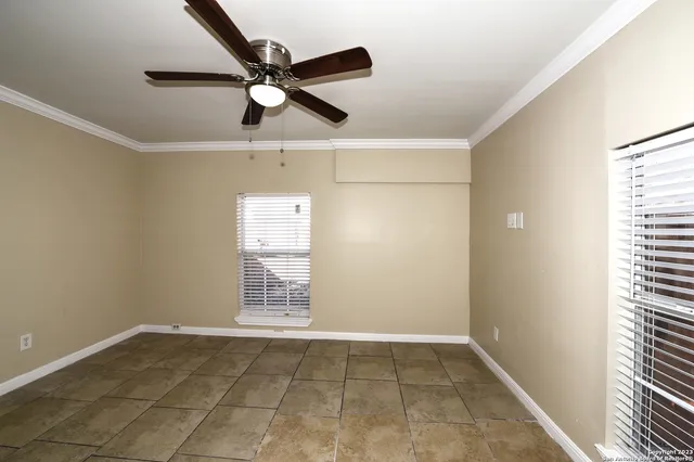 a view of an empty room and window