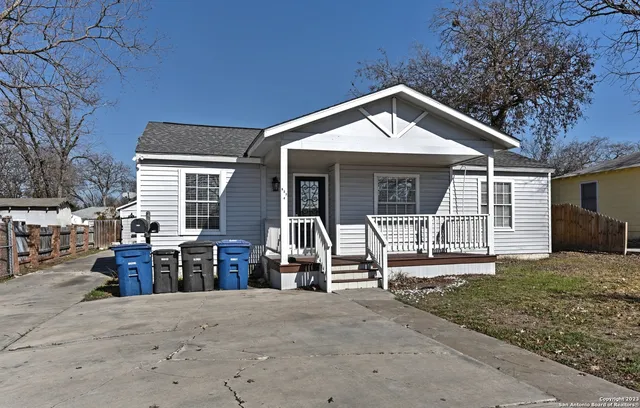 a front view of a house with a patio