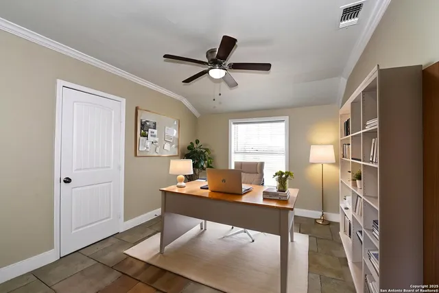 a workspace with furniture and window