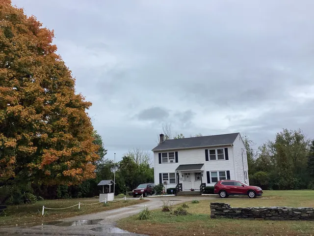 a cars parked in front of a house