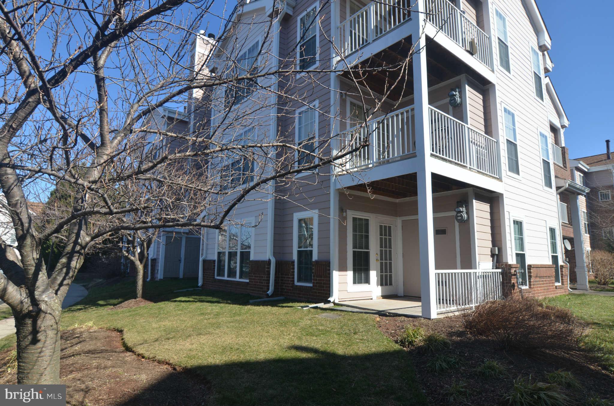 21023 Timber Ridge Terrace, Unit 104 Ashburn, VA 20147 - Photo 2 of 29 Exterior (Front)