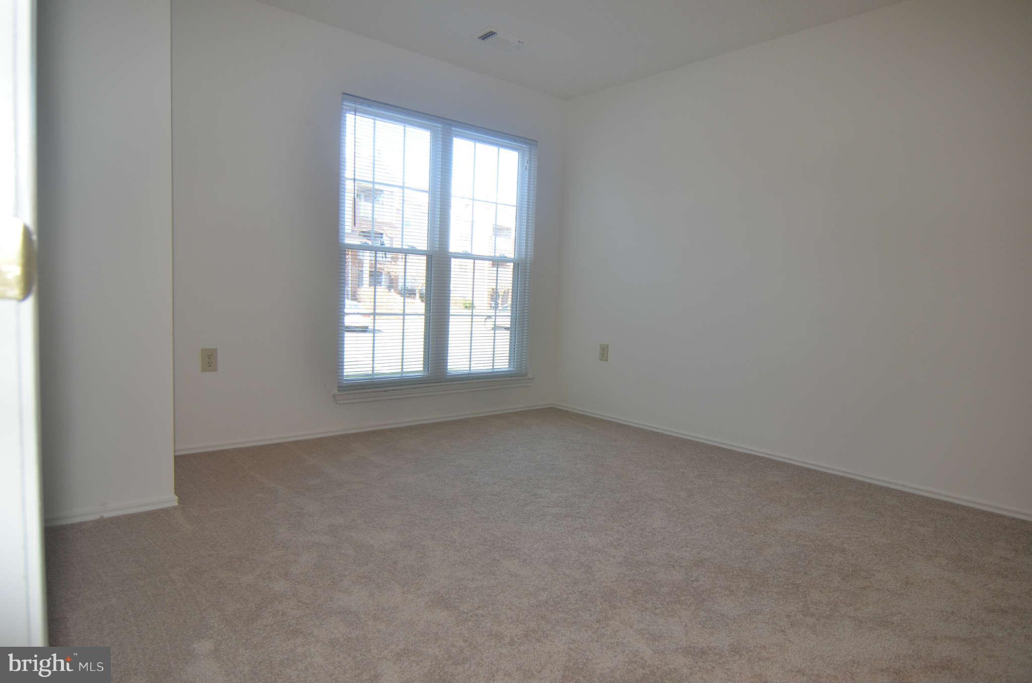 21023 Timber Ridge Terrace, Unit 104 Ashburn, VA 20147 - Photo 13 of 29 Bedroom