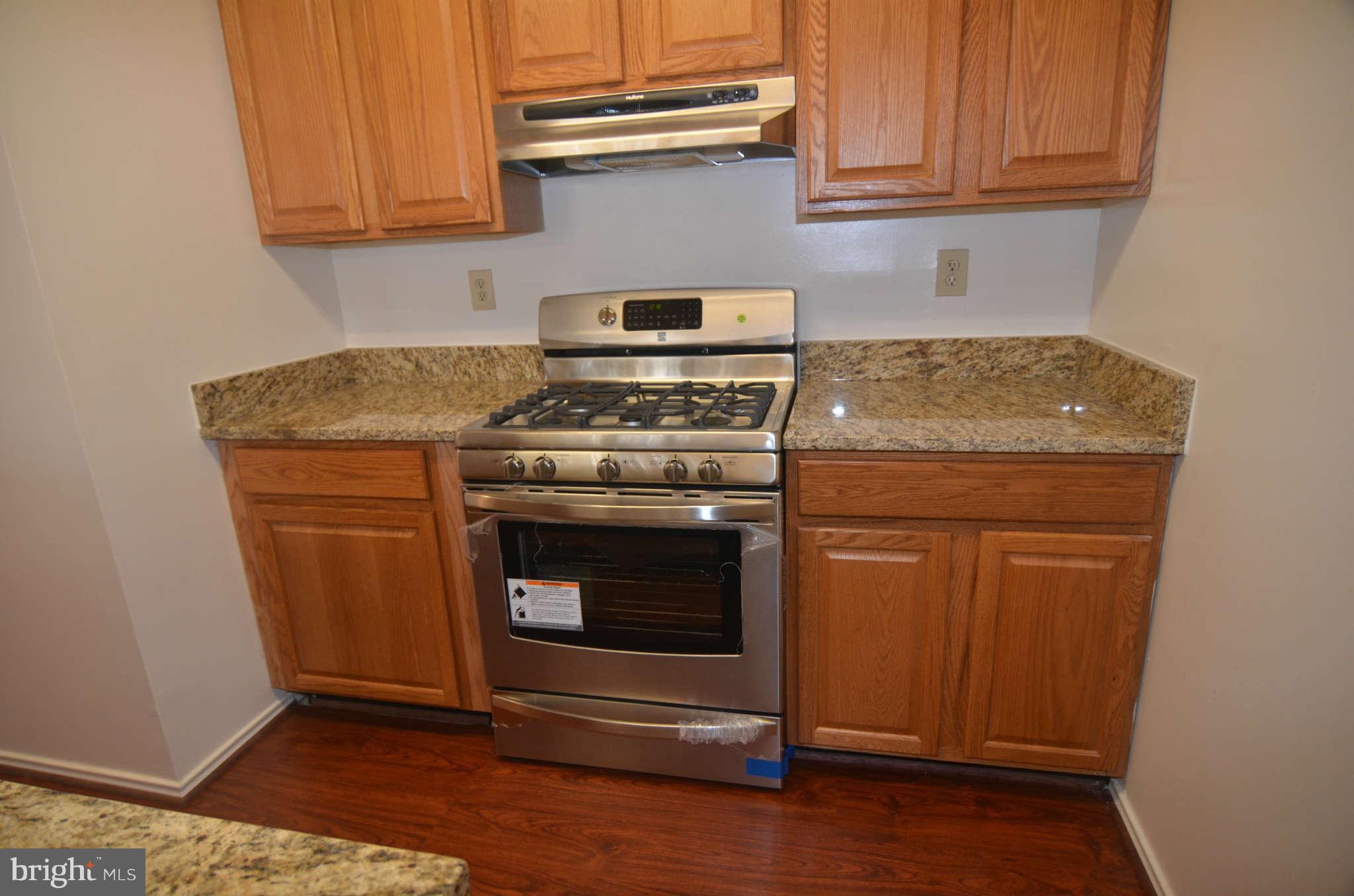 21023 Timber Ridge Terrace, Unit 104 Ashburn, VA 20147 - Photo 5 of 29 Kitchen