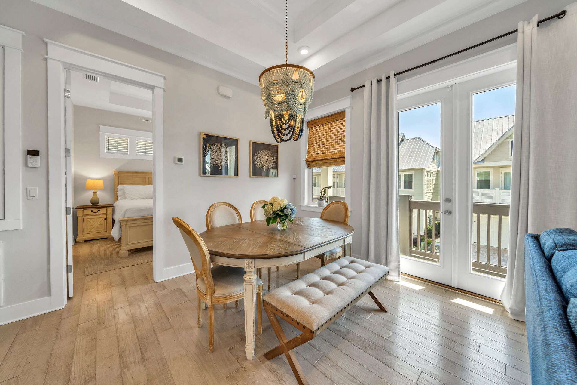 309 Milestone Dr Inlet Beach, Unit C Inlet Beach, FL 32461 - Photo 1 of 30 a view of a dining room with furniture window and wooden floor