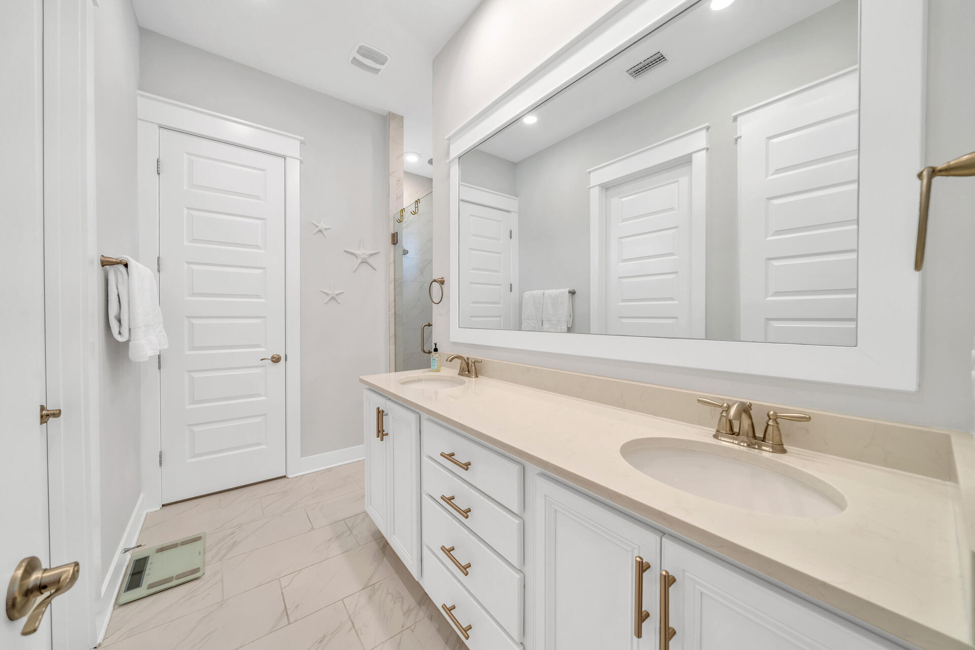 309 Milestone Dr Inlet Beach, Unit C Inlet Beach, FL 32461 - Photo 13 of 30 a bathroom with a granite countertop sink and a mirror