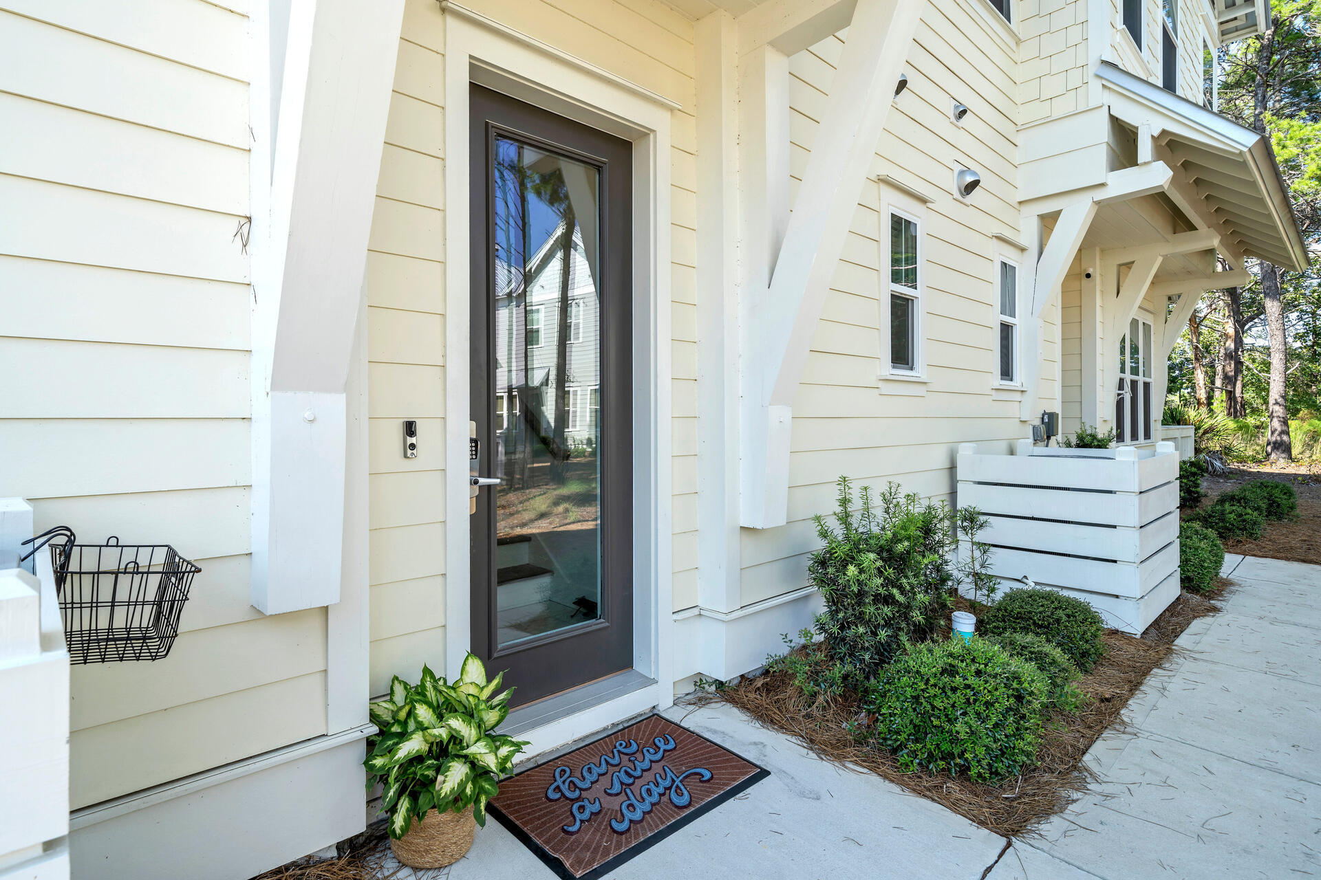 309 Milestone Dr Inlet Beach, Unit C Inlet Beach, FL 32461 - Photo 29 of 30 a view of a door with a potted plant
