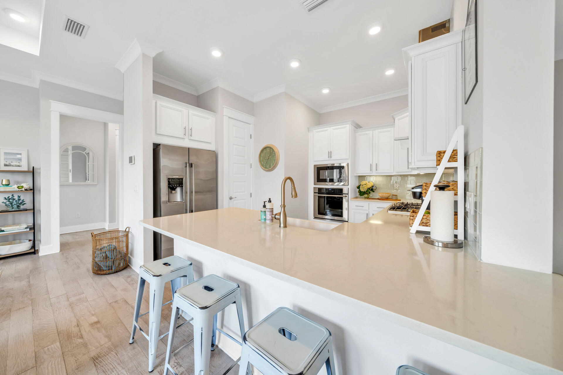 309 Milestone Dr Inlet Beach, Unit C Inlet Beach, FL 32461 - Photo 5 of 30 a large kitchen with a table and chairs