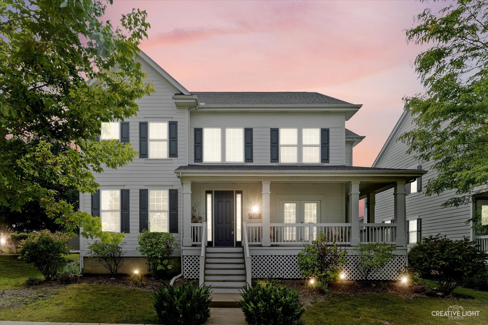 147 Gillett Street Sugar Grove, IL 60554 - Photo 3 of 32 a front view of a house with a yard