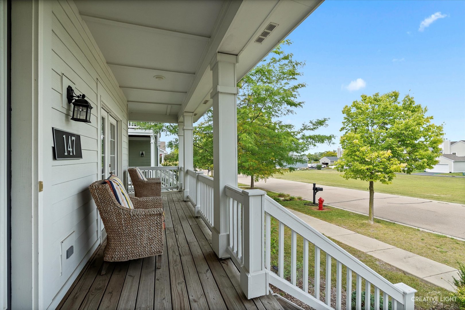 147 Gillett Street Sugar Grove, IL 60554 - Photo 4 of 32 a view of balcony with furniture and garden