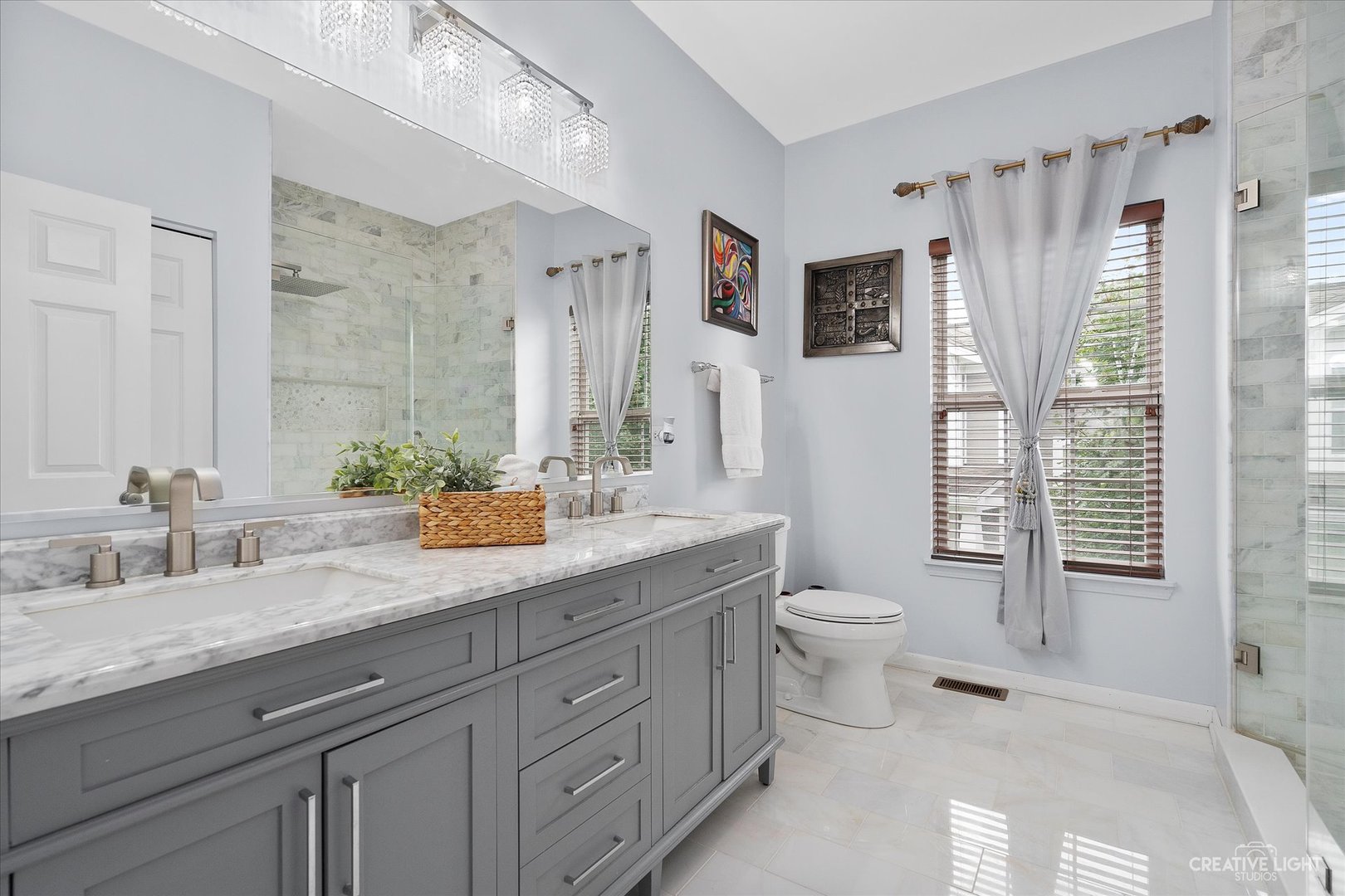 147 Gillett Street Sugar Grove, IL 60554 - Photo 8 of 32 a bathroom with a granite countertop sink toilet and large mirror