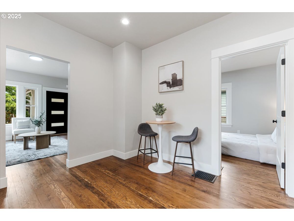 7216 North Ivanhoe Street Portland, OR 97203 - Photo 13 of 30 a living room with furniture and a wooden floor