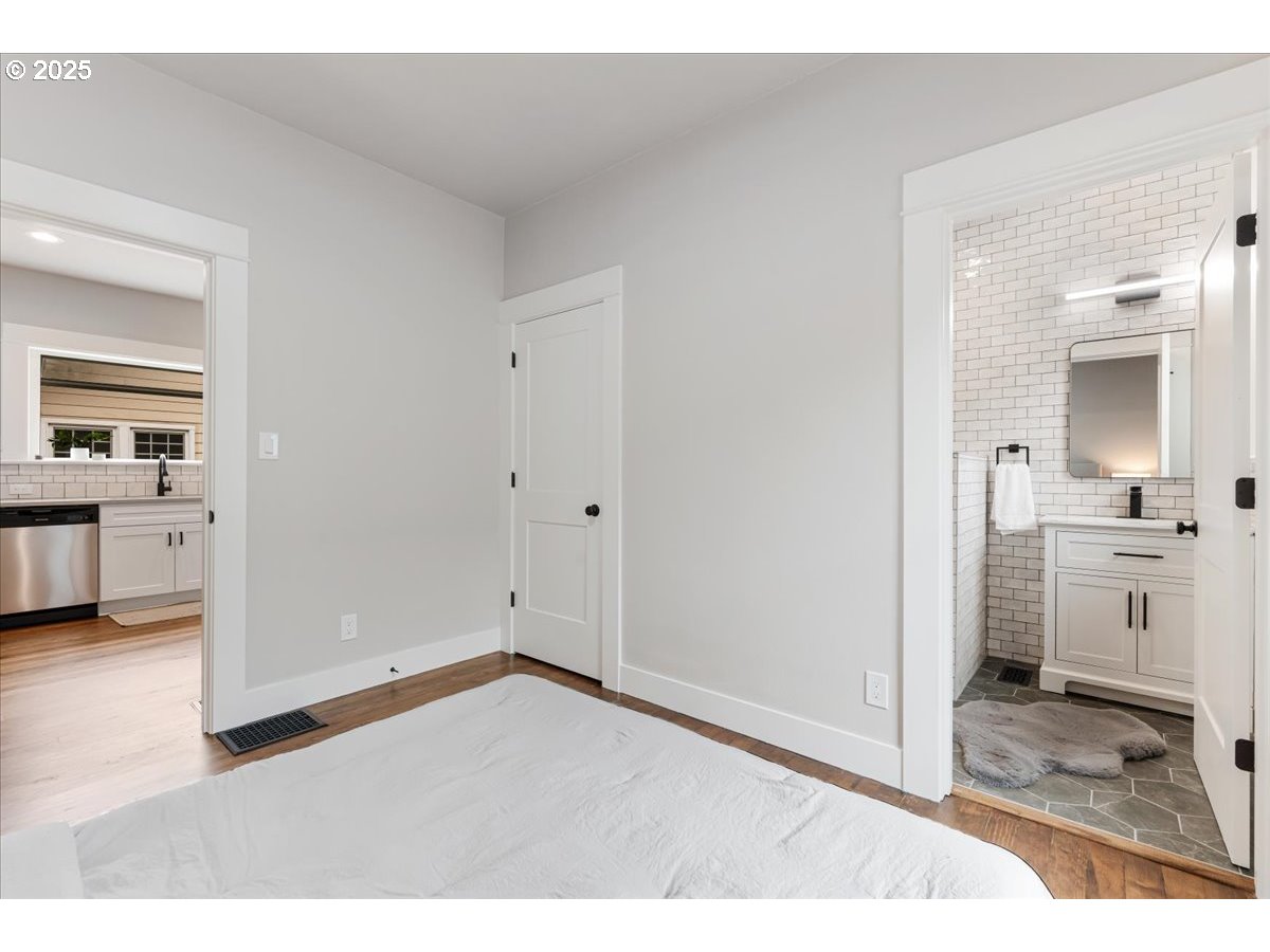 7216 North Ivanhoe Street Portland, OR 97203 - Photo 15 of 30 a bathroom with a sink and a mirror