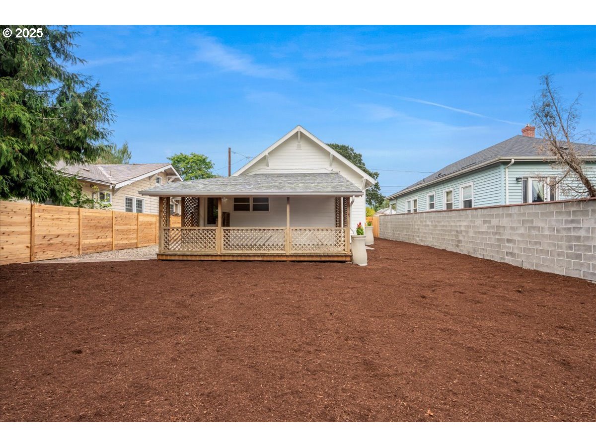 7216 North Ivanhoe Street Portland, OR 97203 - Photo 30 of 30 a view of a house with a balcony