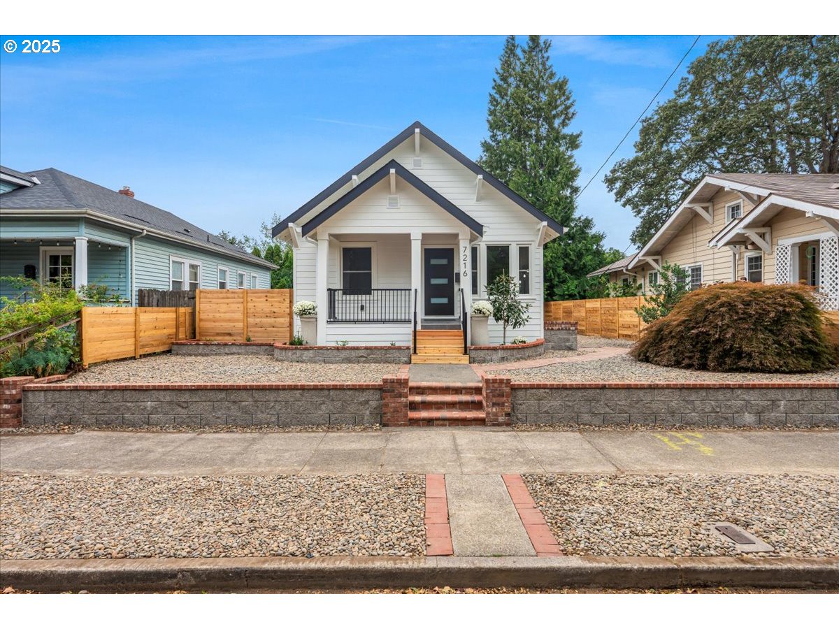 7216 North Ivanhoe Street Portland, OR 97203 - Photo 3 of 30 a view of a house with a yard