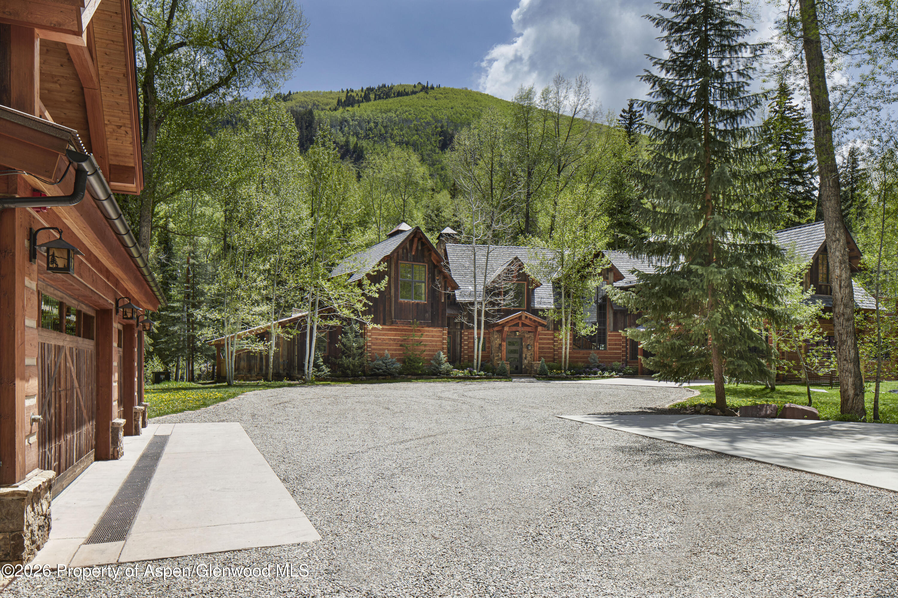 143 Conundrum Creek Road Aspen, CO 81611 - Photo 2 of 16 a view of a house with a park