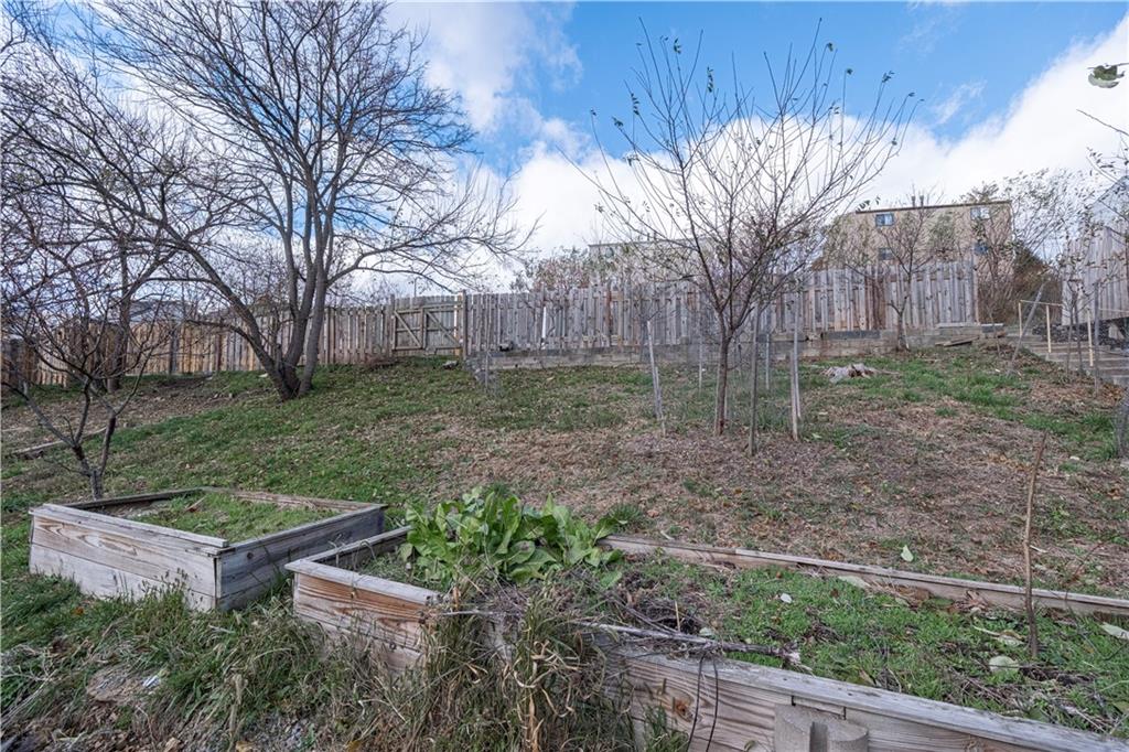 201 Friday Road Pittsburgh, PA 15209 - Photo 14 of 39 a view of a backyard with large trees