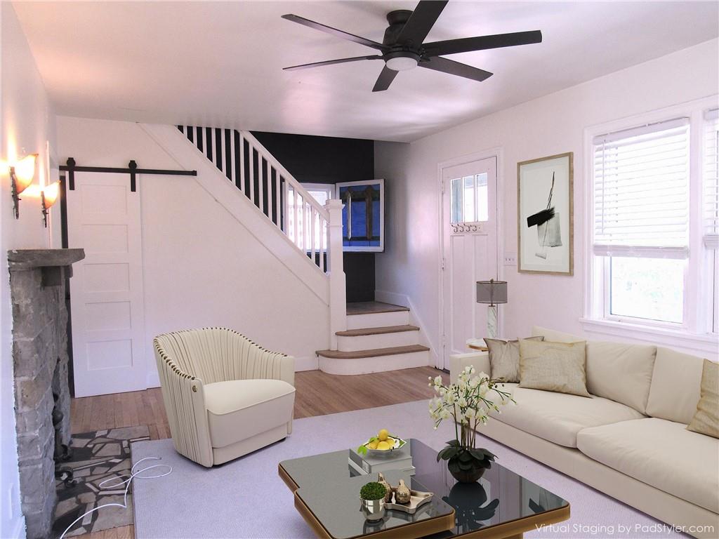 201 Friday Road Pittsburgh, PA 15209 - Photo 23 of 39 a living room with furniture and a large window