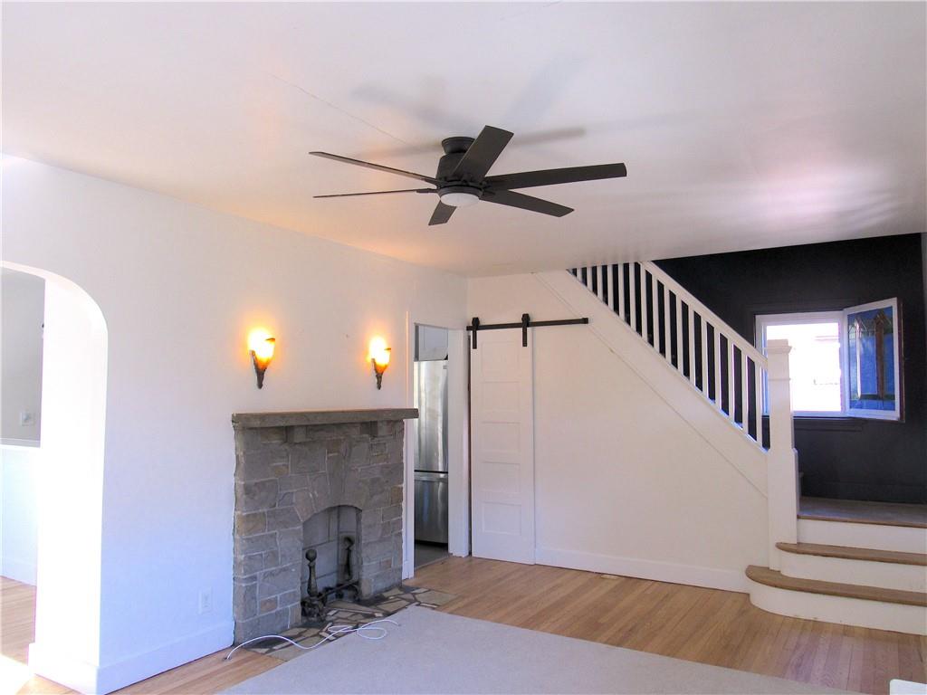 201 Friday Road Pittsburgh, PA 15209 - Photo 23 of 39 a view of an empty room fire place and a fireplace