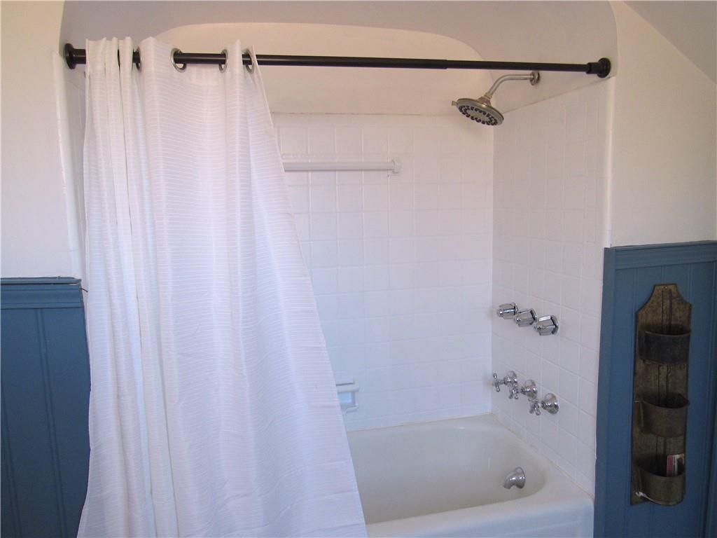 201 Friday Road Pittsburgh, PA 15209 - Photo 30 of 39 a bathroom with a shower and a tub