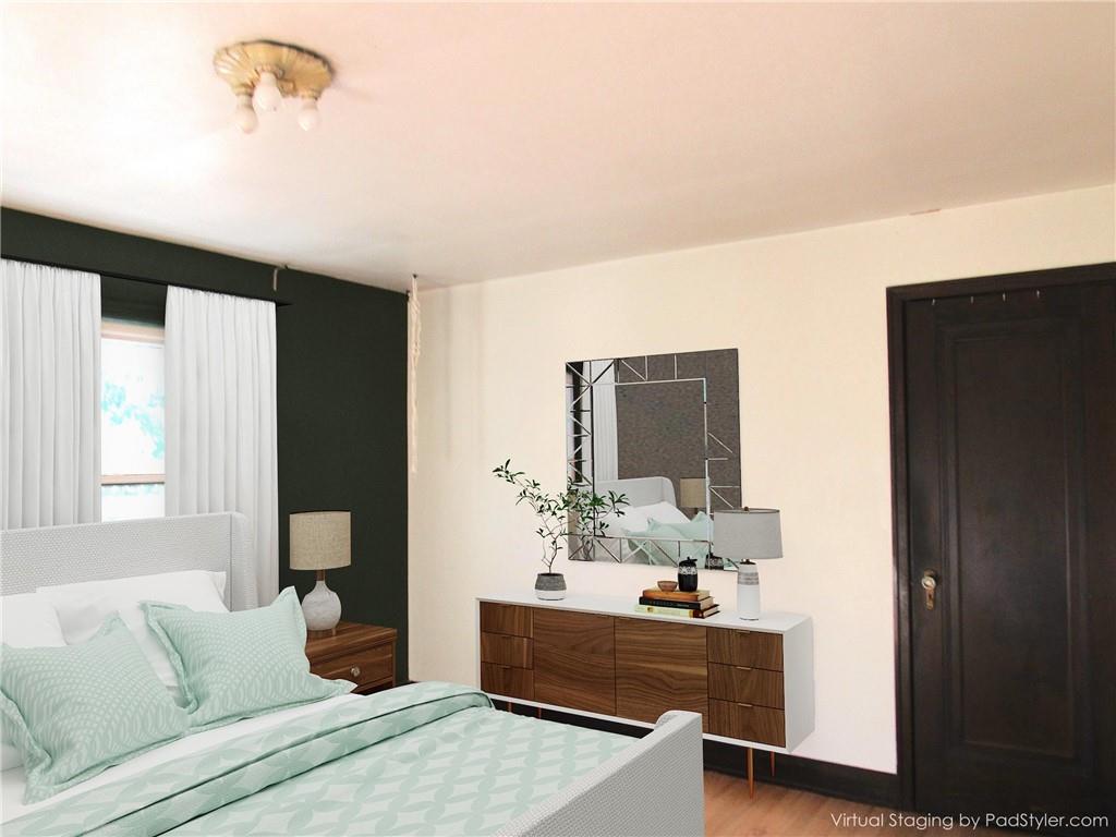 201 Friday Road Pittsburgh, PA 15209 - Photo 33 of 39 a living room with furniture and a flat screen tv