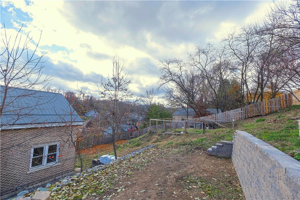 201 Friday Road Pittsburgh, PA 15209 - Photo 6 of 39 a backyard of a house with lots of green space