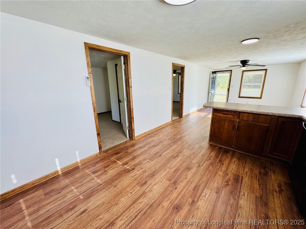 790 Old Whiteville Road Lumberton, NC 28358 - Photo 13 of 29 a view of a room with wooden floor and a sink