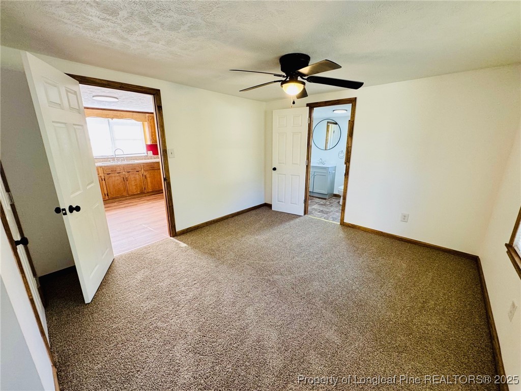 790 Old Whiteville Road Lumberton, NC 28358 - Photo 20 of 29 a view of an entryway with a hallway