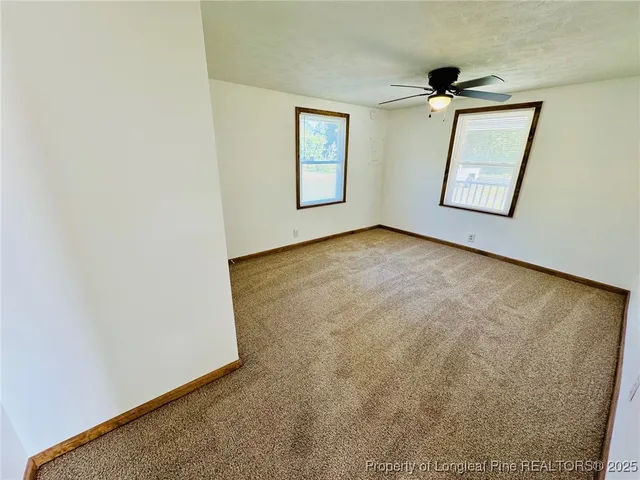 an empty room with window