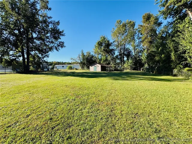 a view of a swimming pool and outdoor space