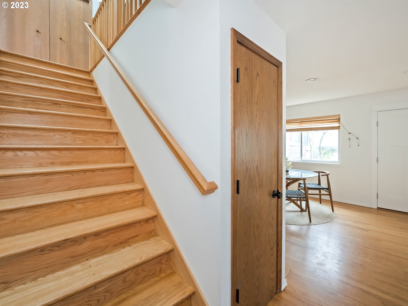 5928 Southwest Yamhill Street Portland, OR 97221 - Photo 9 of 25 a view of entryway and hall with wooden floor